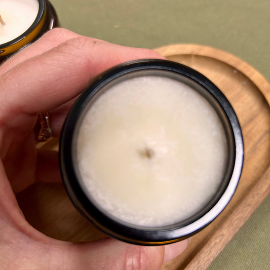 small amber glass candle - imperfect