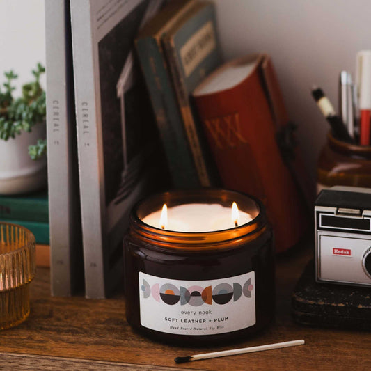 Double wick candle by every nook. Soft Leather + Plum scented soy wax candle