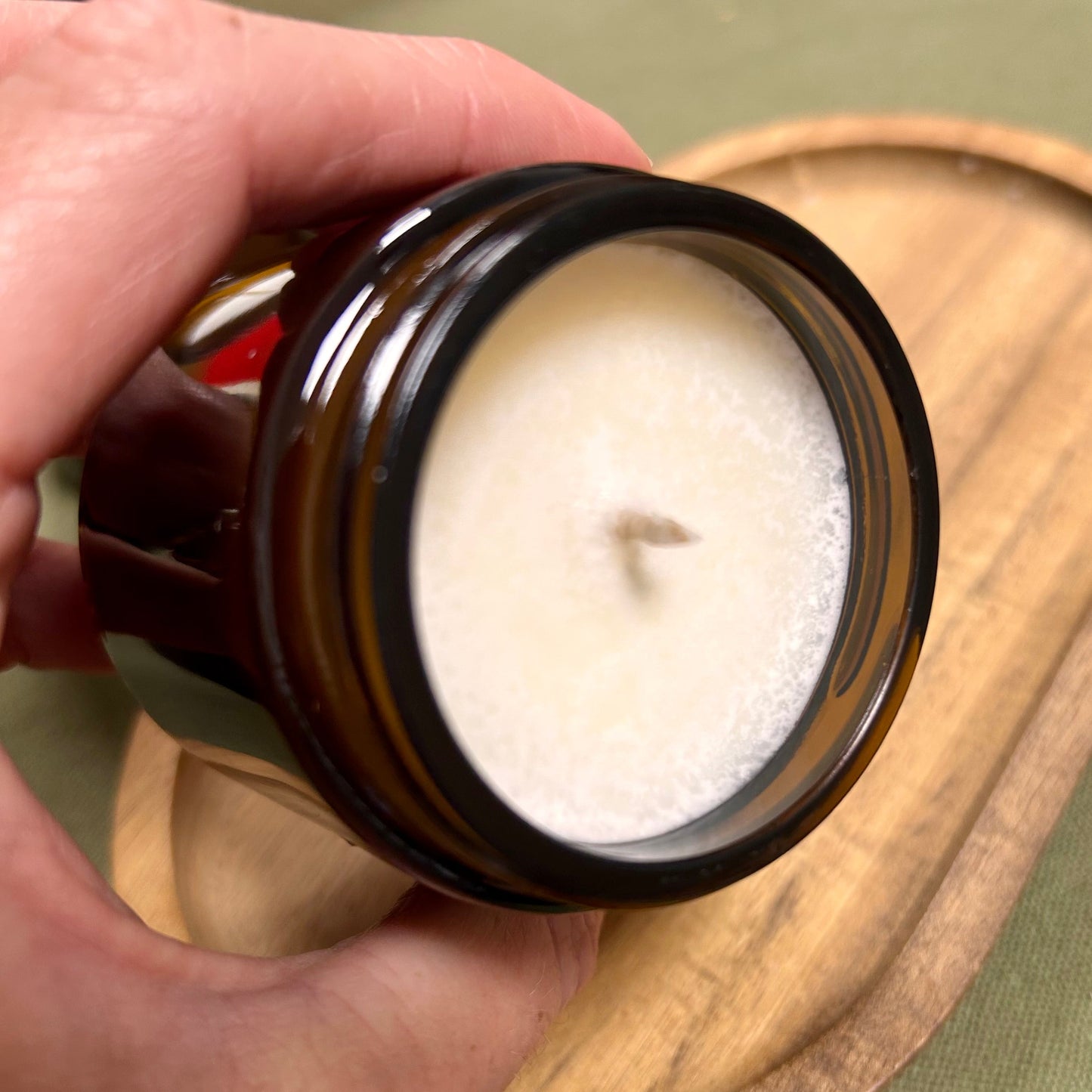 small amber glass candle - imperfect