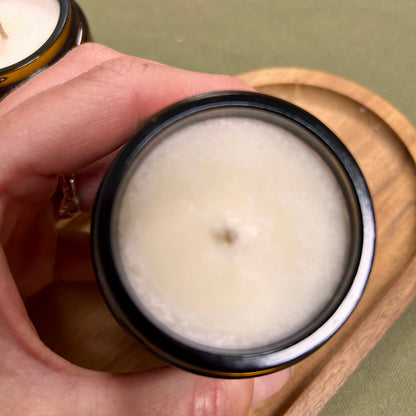small amber glass candle - imperfect