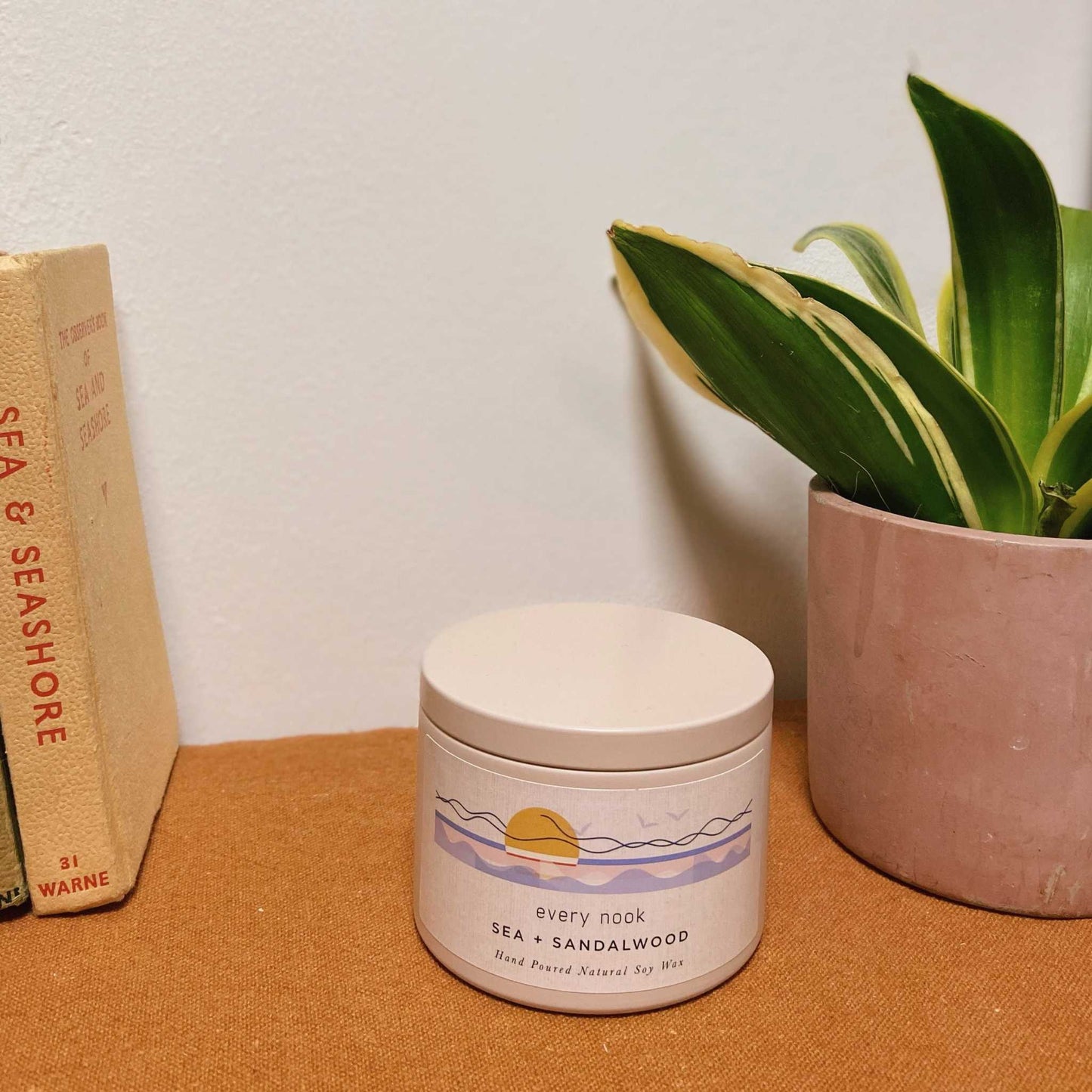 Sea + Sandalwood scented tin candle
